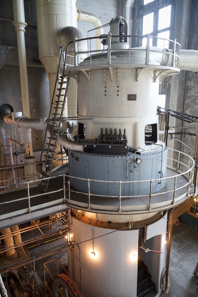 Large industrial rotating machinery inside Georgetown Steam Plant