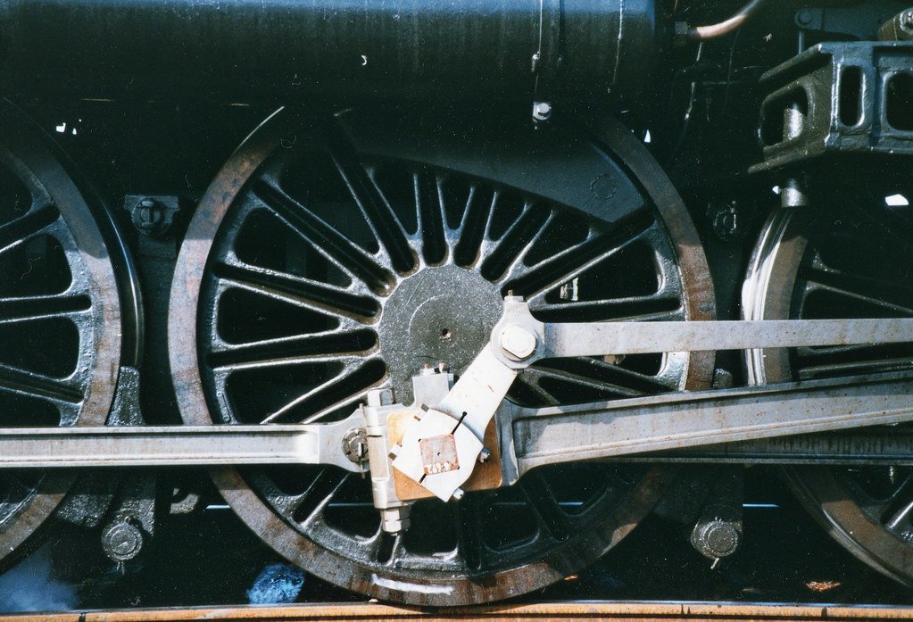 Steam locomotive driving wheels and axle bearing assembly close-up